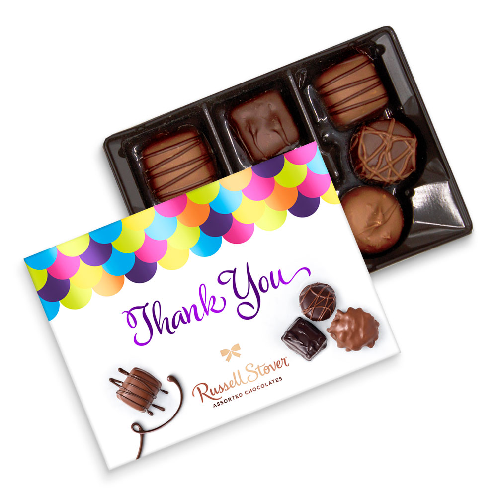 Box of chocolates in a decorative box with Thank you on it made in small batch chocolates