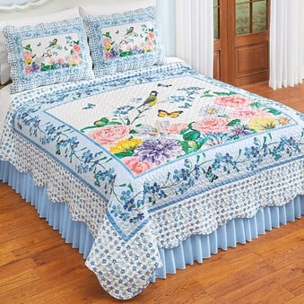 Bedroom decor with spring themed colorful bright colored flower bedspread