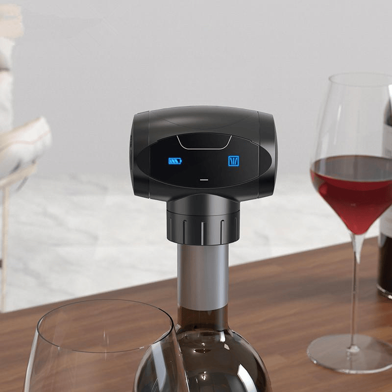 Unique Wine Accessories wine vacuum stopper is shown here. It comes in black and is electric. 