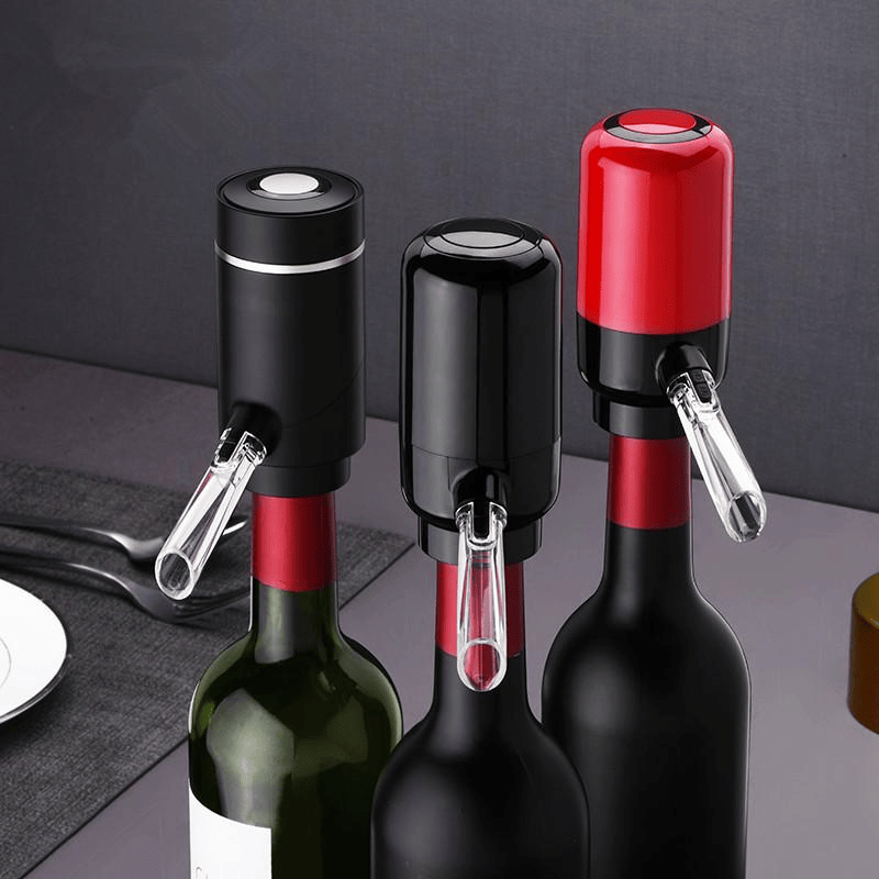 Here is depicted 3 bottle aerators in colors on red and black on top of the wine bottle neck.